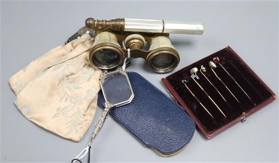 Six stick pins, various, a pair of mother of pearl opera glasses with telescopic handle and two other items,